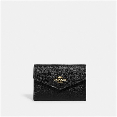 Cartera coach best sale negra mujer